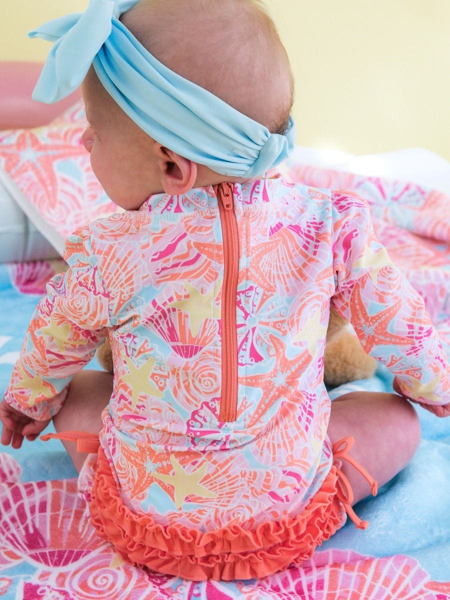 RuffleButts + RuggedButts Baby Long Sleeve One Piece Rash Guard Swimsuit, With Signature Rear Ruffles