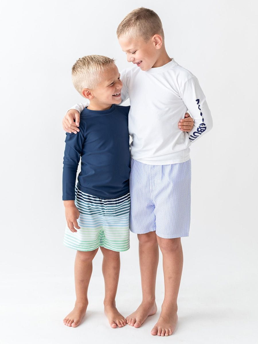 RuffleButts + RuggedButts Baby Long Sleeve Rash Guard, Navy