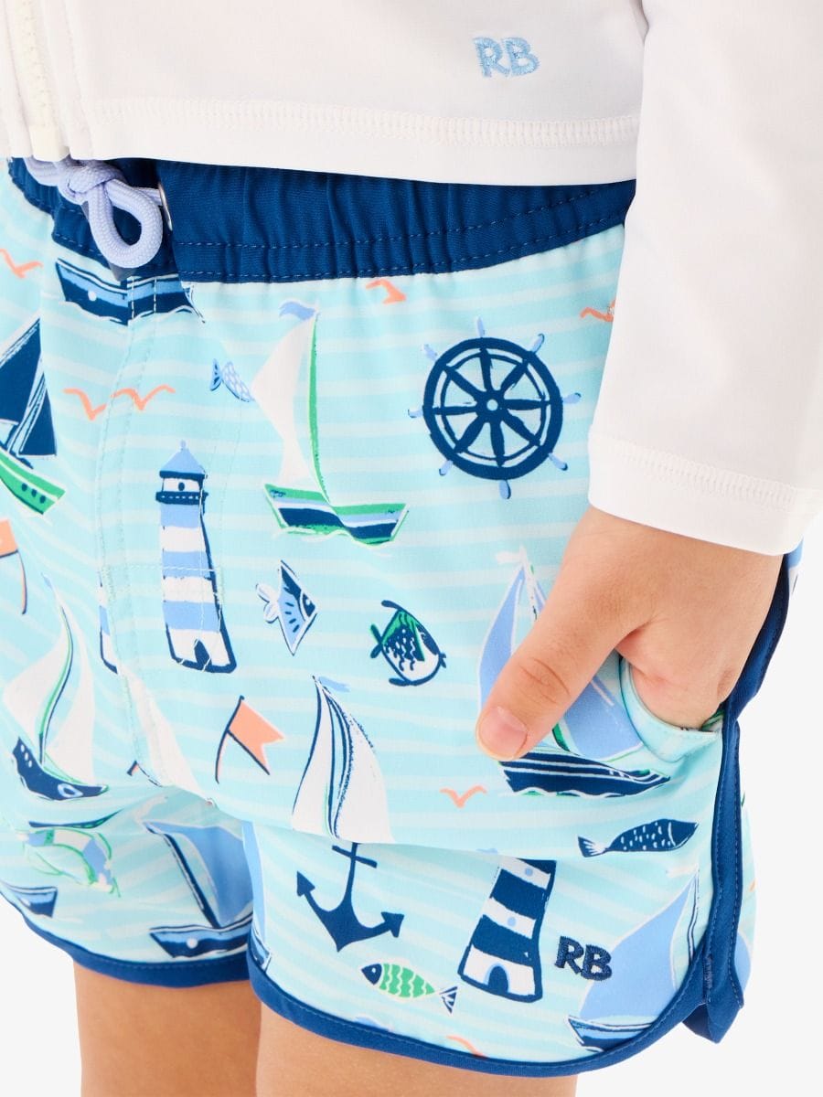 RuffleButts + RuggedButts Baby Performance Hybrid Dolphin Hem Swim Trunks